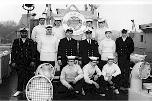 Crew of HMS Dittisham February 1969 Photo courtesy of Carl Graham  Back Row L – R L/Sea Conrad Utting, L/Cook “Sharky” Ward, LWEM “Paddy” Thompson, AB Nick ? Back Row L – R CPO Cox’n “Raggy” Naylor, LMEM Fred ? , Lt John “Blossom” Bloom, PO1(G) Carl “Billy” Graham, POMEM “Chappy” Chapel. Front Row L – R MEM1 Knocker” White, AB John “Grinty” Grint, RO1(T) Peter Thompson