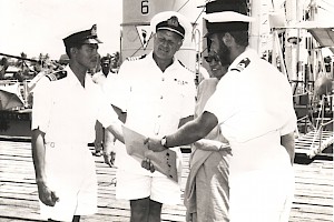 Lt Cdr S. Campbell, CO DARTINGTON hands over to Lt Cdr Malcolm Alvisse KD MAHAMIRU as Officer in Tactical Command, Borneo Waters in the presence of the Governor of Sarawak, Tun Abang Openg and Captain Roddy Mc Donald, COMNAVBOR  September 1966